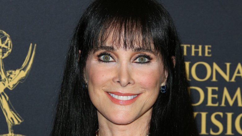 Connie Sellecca smiles on the red carpet in 2015