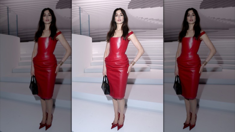 anne hathaway at the versace fashion show in 2024 milan