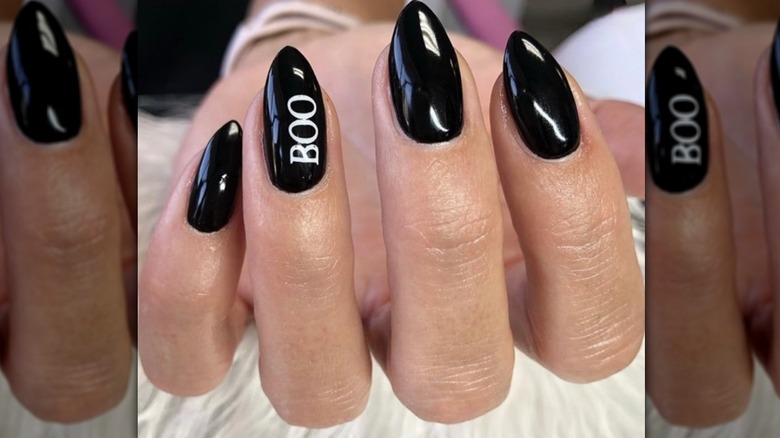 Boo accent nail on black manicure