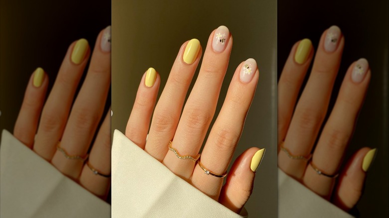 yellow and bees manicure