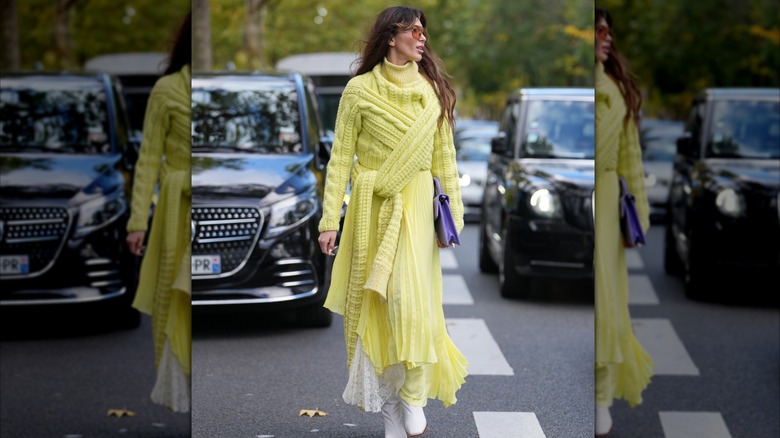 Woman wearing a chunky turtleneck sweater