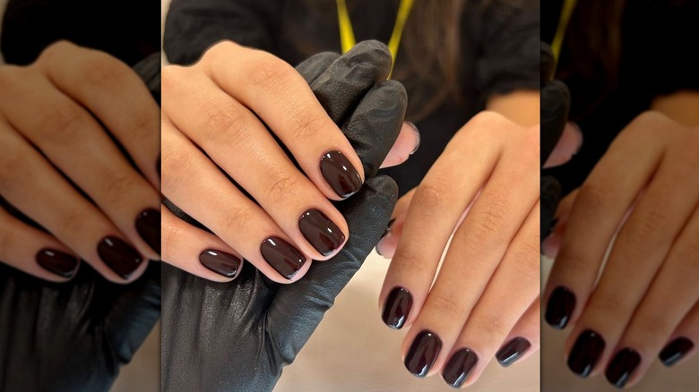 A woman with brown nails on Instagram