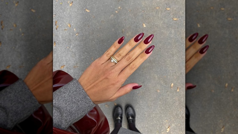 A woman on Instagram with wine red nails