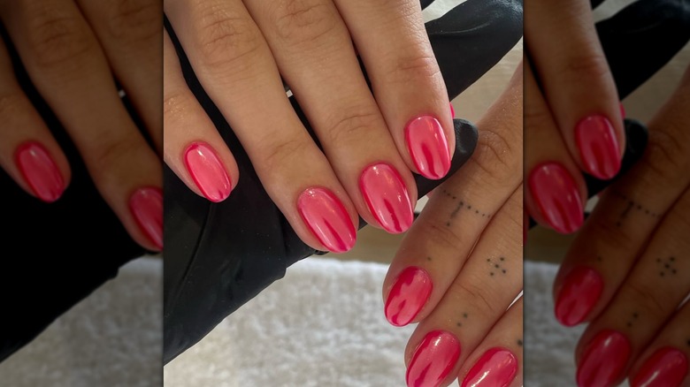 A woman with pink nails on Instagram