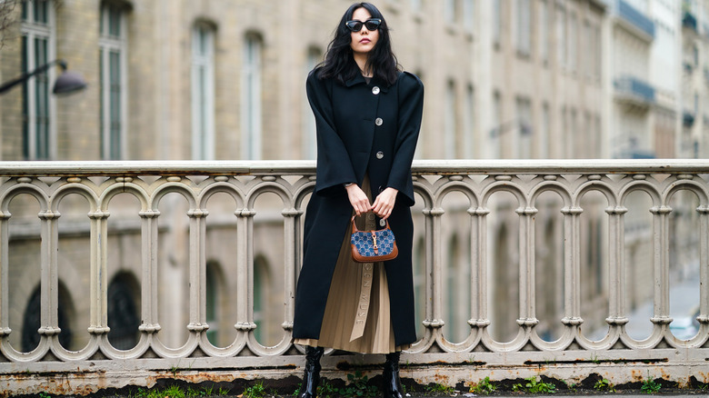 Woman in a black coat 