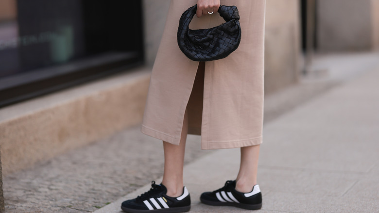 woman wearing Adidas Sambas