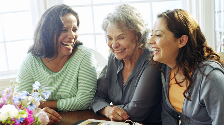 three women smiling