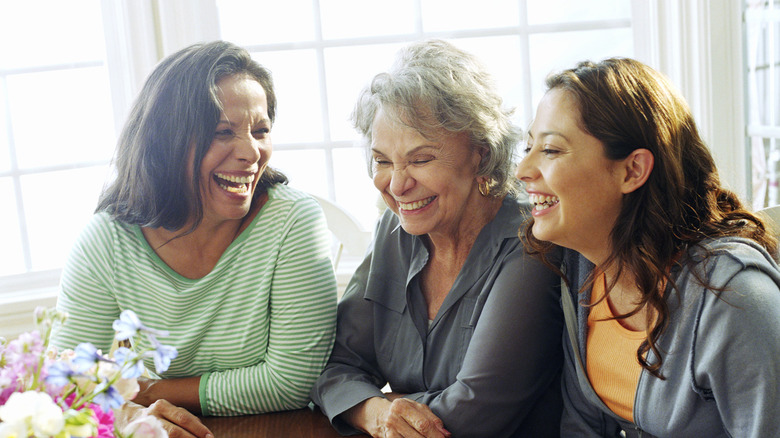 three women smiling