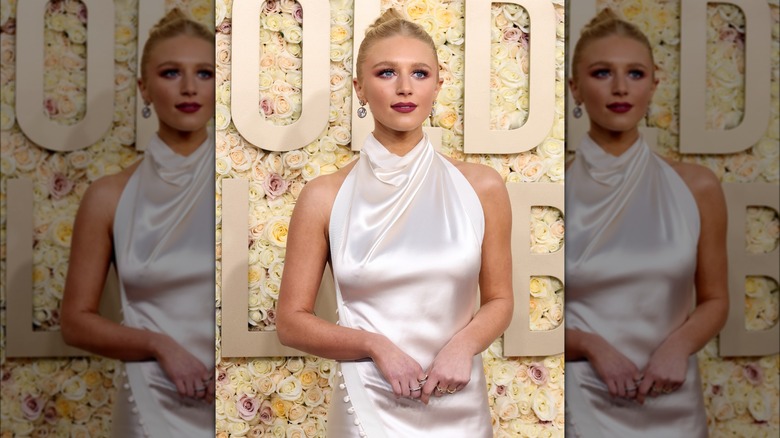 Julia Schlaepfer wearing berry-toned makeup and an updo at the 2025 Golden Globes