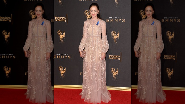 Alexis Bledel on the red carpet in a sheer long dress
