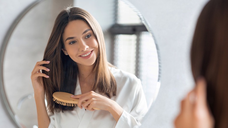 woman brushing ends