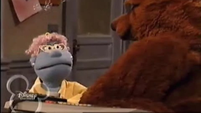 blue muppet with glasses