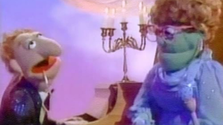 two muppets sitting