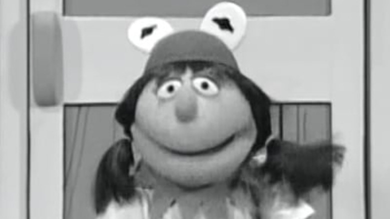 muppet with kermit hat