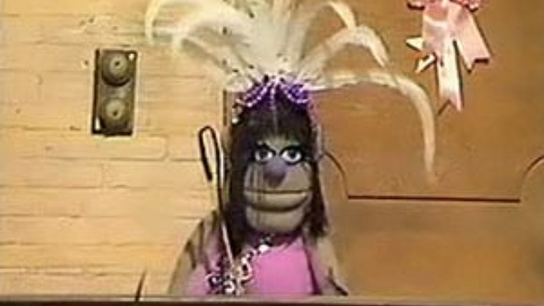 muppet with tall hat