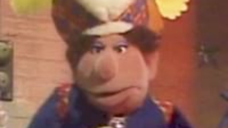 muppet wearing a hat