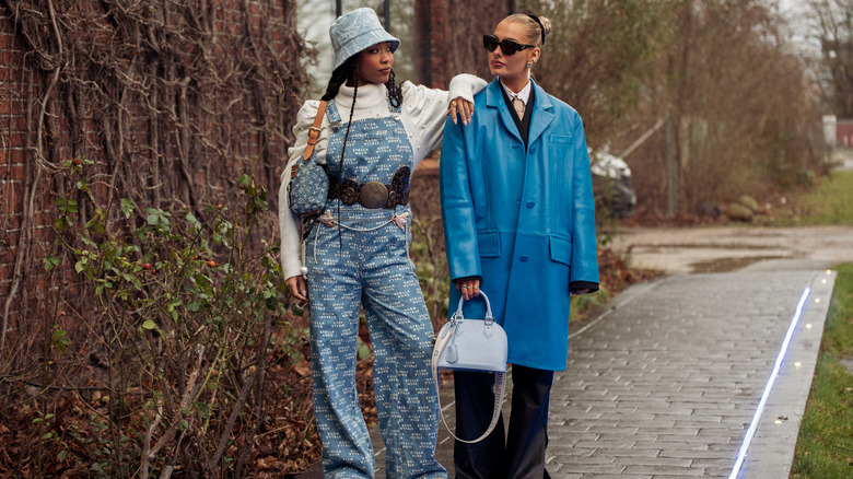 Two women holding bags 