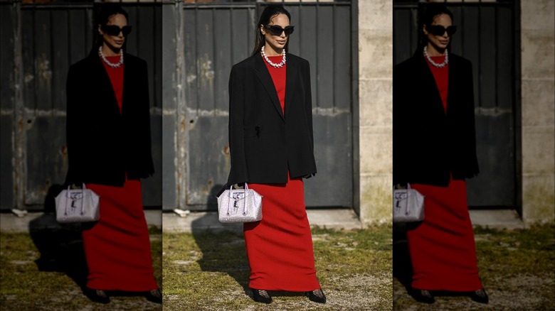 Woman in a silver bag 