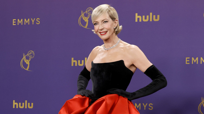 Allison Janney in a black strapless dress with a blonde bob