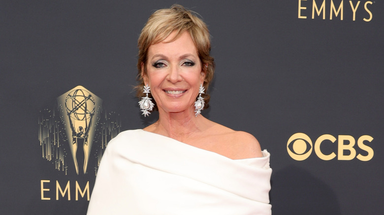 Allison Janney in blonde hair and a white dress in 2021