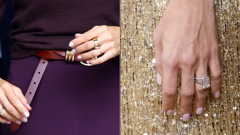 A close up of Meghan Markle's hands and Amal Clooney's hand with a view of their nail polish and jewelry