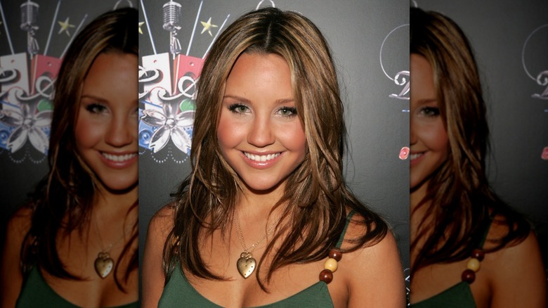 Amanda Bynes smiles with short brond hair