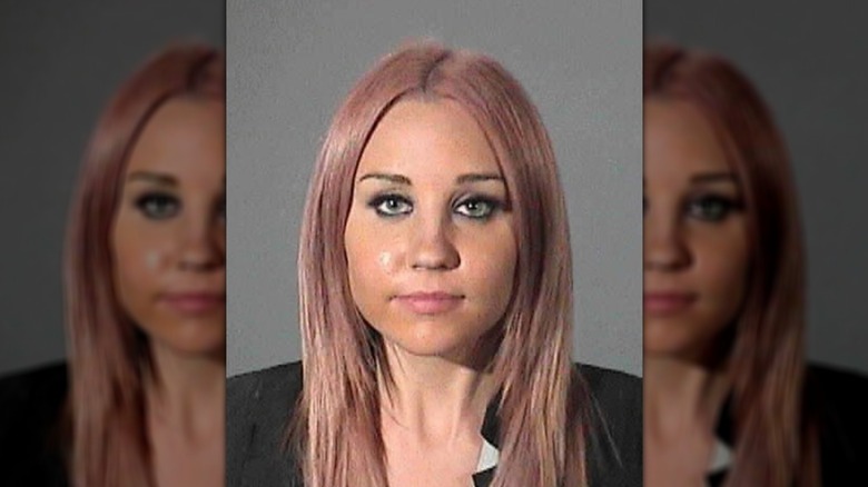 Amanda Bynes poses with pastel pink hair