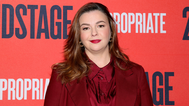 Amber Tamblyn smiles on the red carpet in 2023