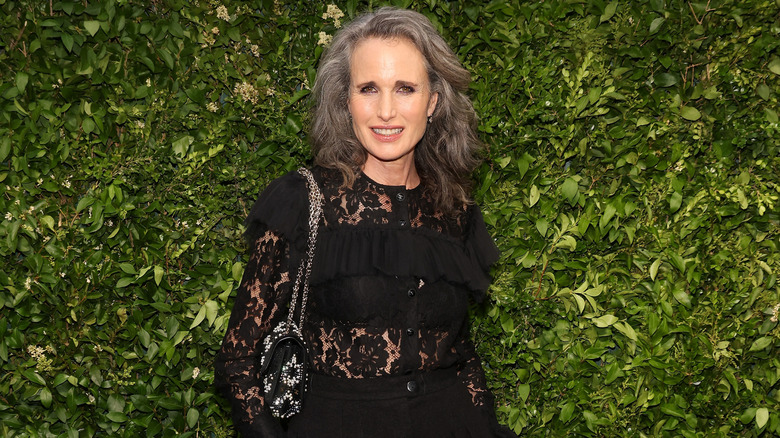 Andie MacDowell smiles on the red carpet in 2022