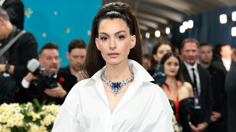 Anne Hathaway posing at the 2025 Met Gala