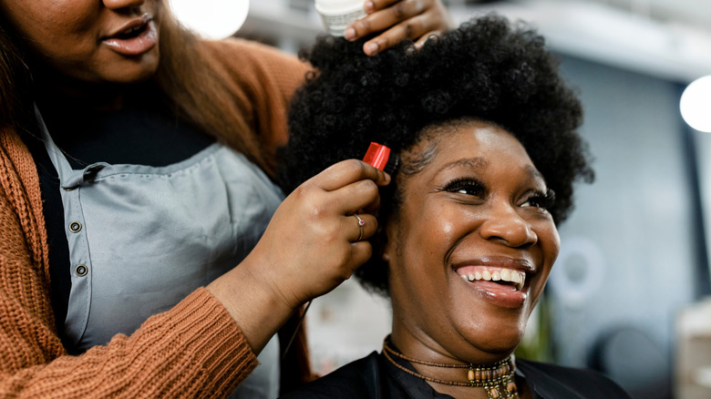 Woman getting her hair done