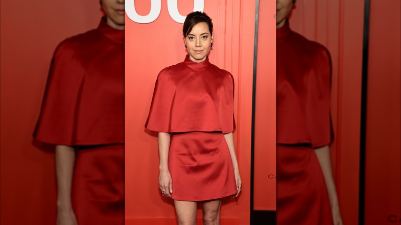Aubrey Plaza in red Carolina Herrera dress