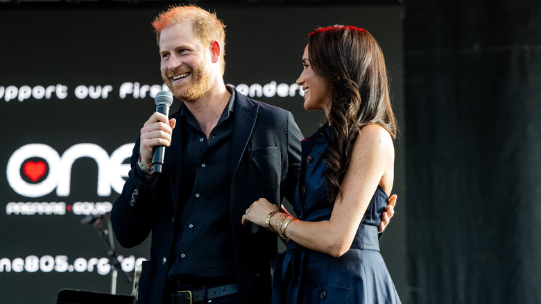 Prince Harry and Meghan Markle on stage in California