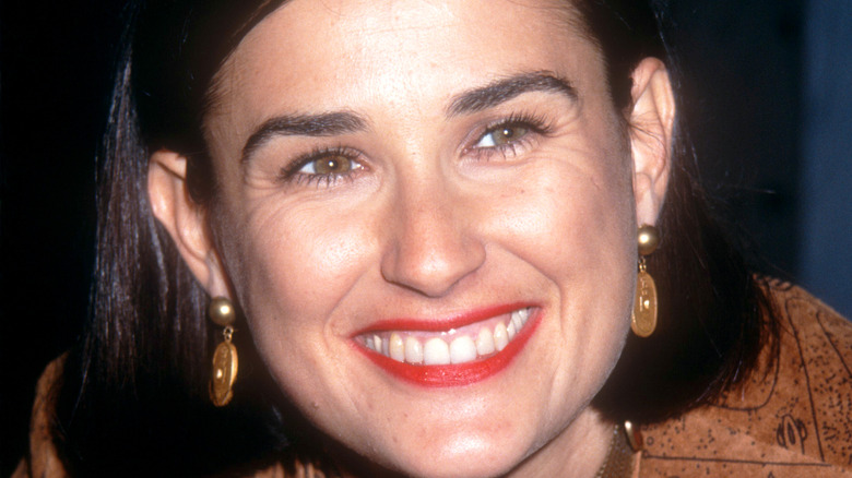 Demi Moore smiling in a 1992 photo