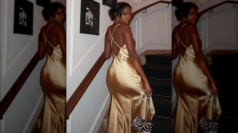 A woman on Instagram in a gold dress