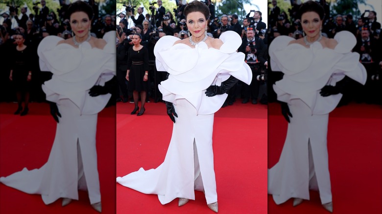 Joan Collins posing