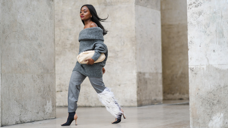 Woman in grey outfit