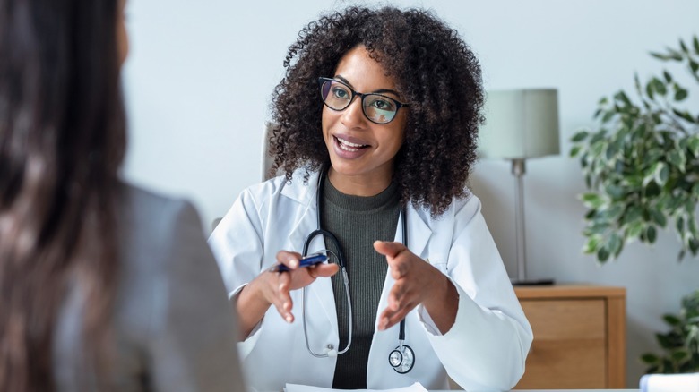 Person talking to a doctor