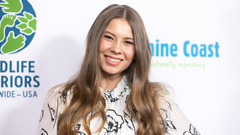 Bindi Irwin with long wavy hair