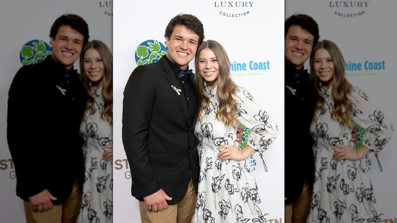 Bindi Irwin next to Chandler Powell on the red carpet