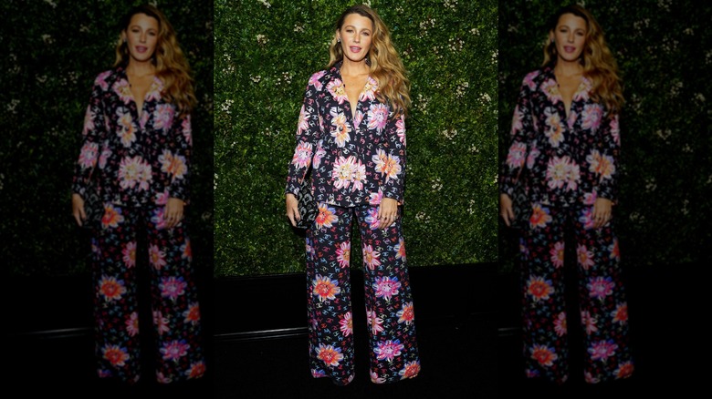Blake Lively in a black and floral wide-leg outfit in Tribeca in 2024