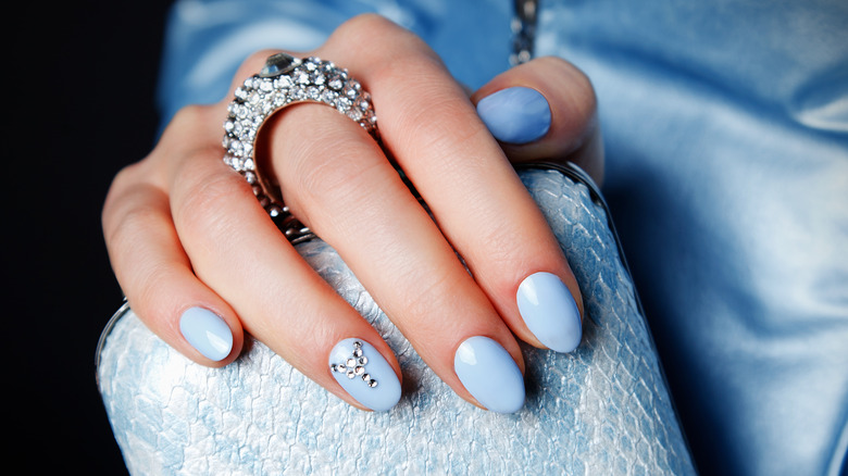 Closeup of blueberry milk manicure