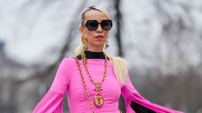 Woman wearing statement jewelry