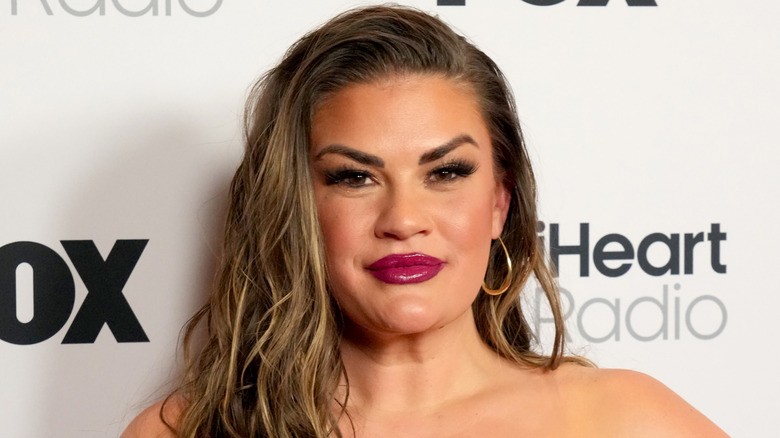 Brittany Cartwright smiles on the red carpet in 2025