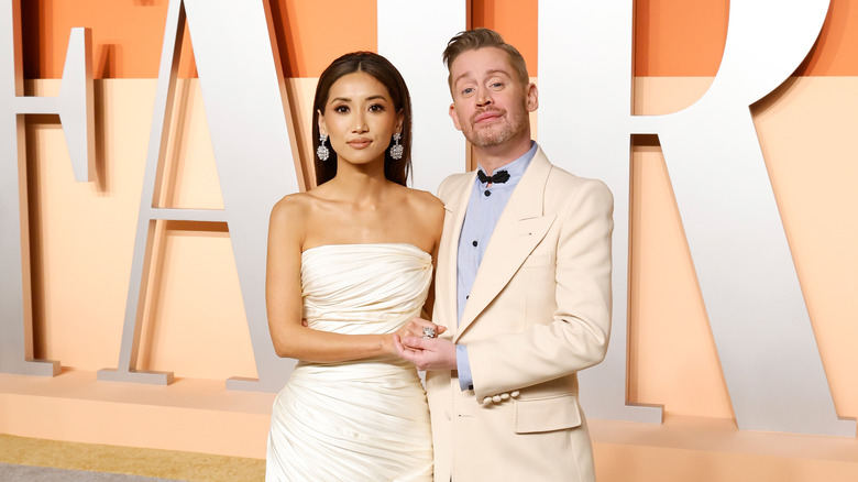 Brenda Song and Macaulay Culkin posing