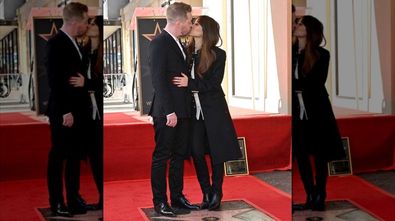 Brenda Song and Macaulay Culkin kissing