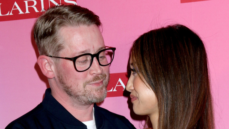 Brenda Song and Macaulay Culkin posing