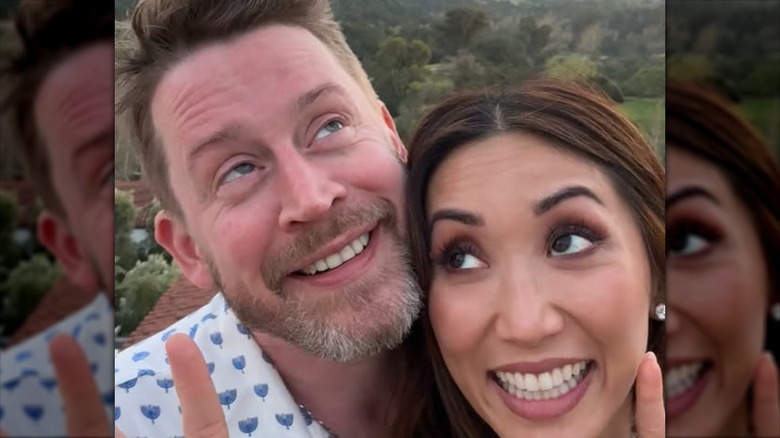 Brenda Song and Macaulay Culkin making silly faces