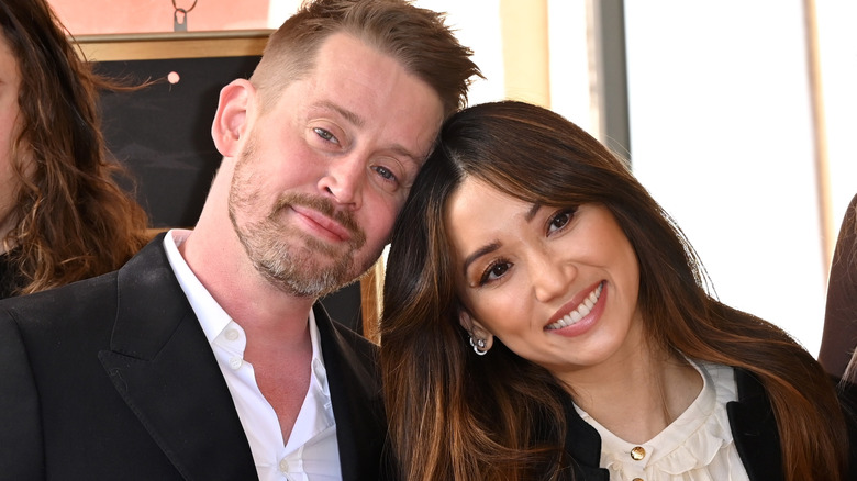 Macaulay Culkin and Brenda Song during Hollywood Walk of Fame Ceremony December 2023