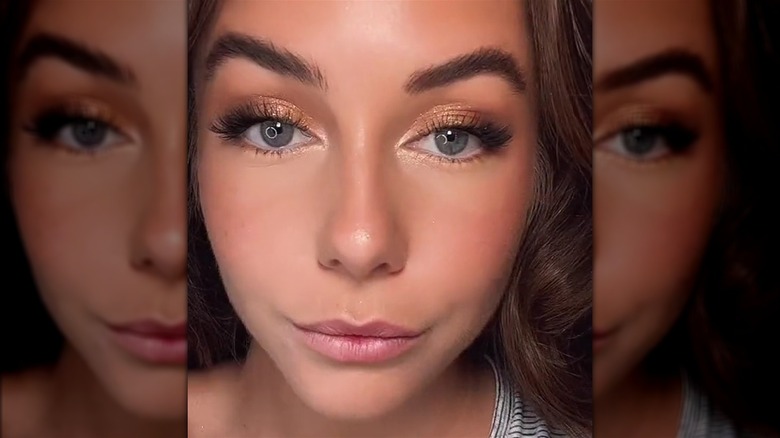 Woman with makeup highlight